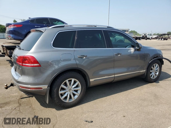 2015 Volkswagen Touareg Lux с VIN WVGEP9BP2FD004595, выставлен на аукционе Copart как лот 59020375 с пробегом 135 319 миль миль и Списание • Salvage title. История ставок и продаж доступна на DreamBid. Изображение 3.