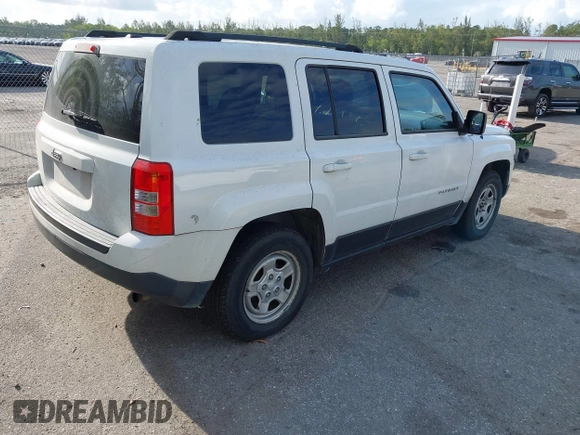 2014 Jeep Patriot Sport with VIN 1C4NJPBBXED671220, listed as a IAAI auction lot 42163245 with 216,848 mi miles. Bid and sale history available at carsss.com. Image 4.