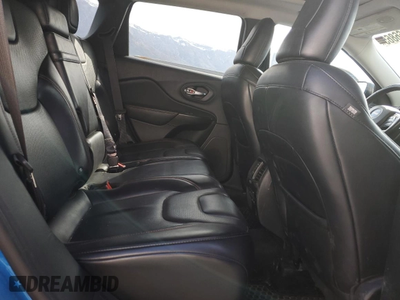 2019 Jeep Cherokee Trailhawk z VIN 1C4PJMBX5KD122328, wystawiony jako Copart lot #54066865 z przebiegiem 59 924 mil mil oraz Szkoda całkowita • Salvage title. Historia ofert i sprzedaży dostępna na DreamBid. Obrazek 11.