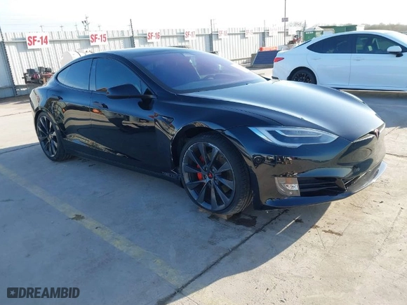 2018 Tesla Model S 75D with VIN 5YJSA1E2XJF257739, listed as a IAAI auction lot 41547387 with 53,919 mi miles. Bid and sale history available at carsss.com. Image 1.
