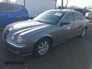 2003 Jaguar S-Type with VIN SAJEA01T23FM93839, listed as a IAAI auction lot 41891973 with 153,761 mi miles and . Bid and sale history available at DreamBid. Image 17.