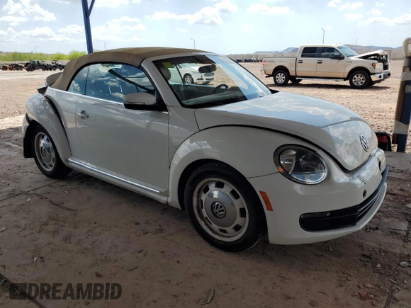 2013 Volkswagen Beetle 2.5L w/Sound/Nav z VIN 3VW5P7AT7DM811992, wystawiony jako Copart lot #59526355 z przebiegiem 102 542 mil mil oraz Szkoda całkowita • Salvage title. Historia ofert i sprzedaży dostępna na DreamBid. Obrazek 4.