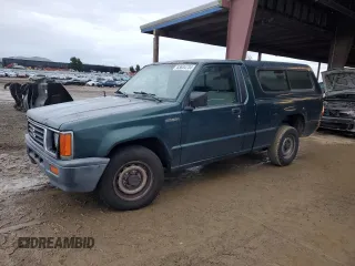 1995 Mitsubishi Mighty Max z VIN JA7LS21G4SP000718, wystawiony jako Copart lot #83634734 z przebiegiem 129 382 mil mil oraz Szkody całkowita. Historia ofert i sprzedaży dostępna na DreamBid. Obrazek 1.