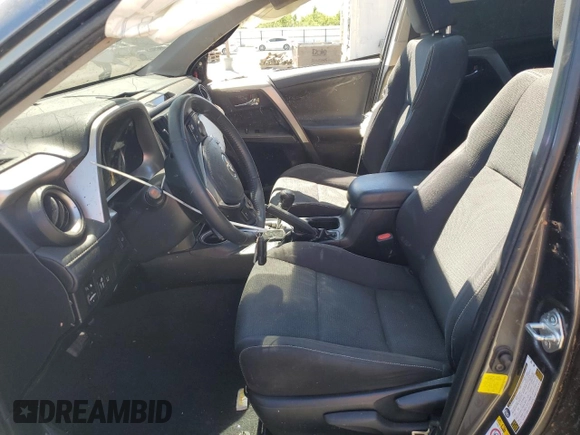 2018 Toyota RAV4 XLE with VIN JTMWFREV6JJ172451, listed as a Copart auction lot 58095775 with Not provided miles and Salvage title. Bid and sale history available at DreamBid. Image 7.