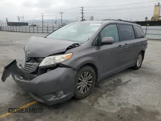2012 Toyota Sienna XLE AAS with VIN 5TDYK3DC2CS274045, listed as a Copart auction lot 59970155 with 219,377 mi miles and Salvage title. Bid and sale history available at DreamBid. Image 1.