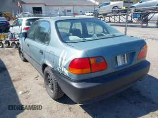 2000 Honda Civic LX with VIN 1HGEJ667XYL058591, listed as a IAAI auction lot 42113441 with 225,945 mi miles. Bid and sale history available at carsss.com. Image 3.