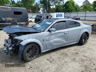 2021 Dodge Charger SRT Hellcat Widebody z VIN 2C3CDXL97MH603070, wystawiony jako Copart lot #57661925 z przebiegiem Nie podano mil oraz Szkoda całkowita • Salvage title. Historia ofert i sprzedaży dostępna na DreamBid. Obrazek 1.
