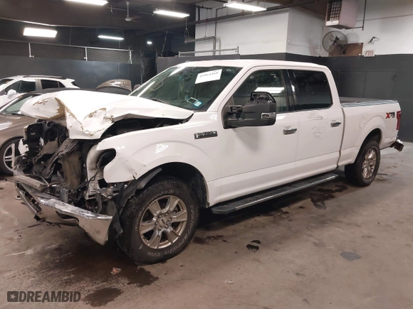 2015 Ford F-150 XLT w/HD Payload Pkg with VIN 1FTFW1EF8FKF09732, listed as a IAAI auction lot 41064468 with 105,340 mi miles. Bid and sale history available at carsss.com. Image 17.