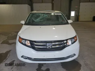 2016 Honda Odyssey Touring Elite with VIN 5FNRL5H91GB070424, listed as a Copart auction lot 55583075 with 115,709 mi miles and Salvage Title. Bid and sale history available at DreamBid. Image 5.