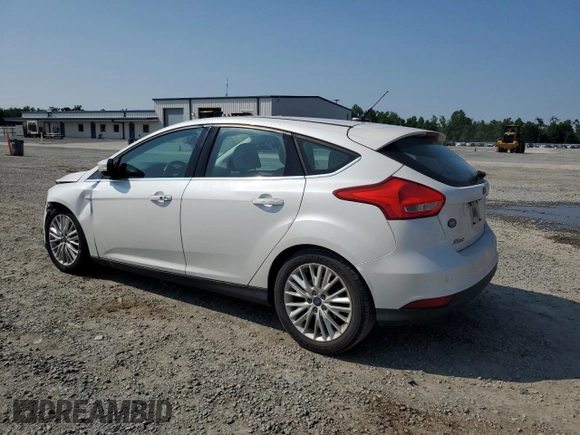 2015 Ford Focus Titanium с VIN 1FADP3N24FL214429, выставлен на аукционе Copart как лот 59159075 с пробегом 157 353 миль миль и Списание • Salvage title. История ставок и продаж доступна на DreamBid. Изображение 2.