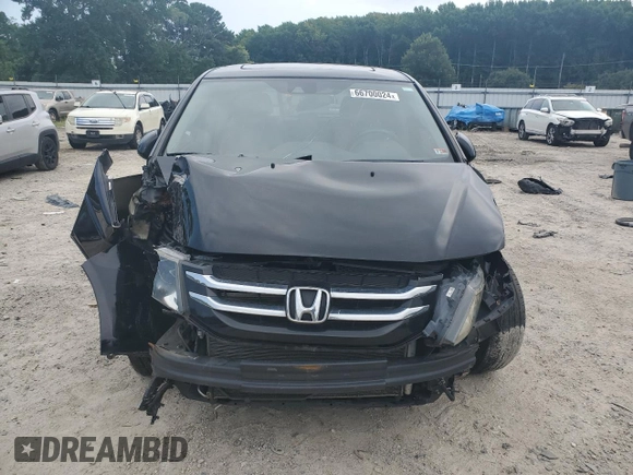 2014 Honda Odyssey EX-L with VIN 5FNRL5H68EB098207, listed as a Copart auction lot 66700024 with 161,701 mi miles and Salvage Title. Bid and sale history available at DreamBid. Image 5.