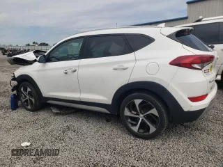 2018 Hyundai Tucson Sport with VIN KM8J33AL6JU735948, listed as a Copart auction lot 56232395 with 126,878 mi miles and Clean title. Bid and sale history available at DreamBid. Image 2.
