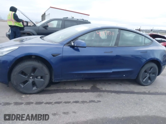 2021 Tesla Model 3 Long Range with VIN 5YJ3E1EB8MF848049, listed as a IAAI auction lot 40974331 with 61,462 mi miles. Bid and sale history available at carsss.com. Image 14.