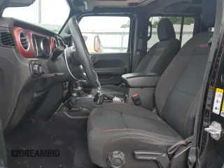 2018 Jeep Wrangler Unlimited Rubicon with VIN 1C4HJXFNXJW141877, listed as a Copart auction lot 55913055 with 71,503 mi miles and Salvage title. Bid and sale history available at DreamBid. Image 7.