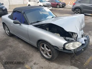 2002 Mazda MX-5 Miata Cloth z VIN JM1NB353320230803, wystawiony jako IAAI lot #41209388 z przebiegiem 84 815 mil mil oraz . Historia ofert i sprzedaży dostępna na DreamBid. Obrazek 1.