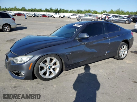 2015 BMW 4 Series 428i with VIN WBA3N7C54FK222324, listed as a Copart auction lot 57644345 with 114,696 mi miles and Salvage title. Bid and sale history available at DreamBid. Image 1.