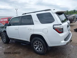 2021 Toyota 4Runner TRD Off Road Premium with VIN JTERU5JR3M5954879, listed as a IAAI auction lot 42291513 with 125,097 mi miles and . Bid and sale history available at DreamBid. Image 14.