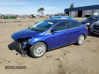 2014 Ford Focus Titanium with VIN 1FADP3J25EL304595, listed as a Copart auction lot 49573805 with 82,233 mi miles and Clean Title. Bid and sale history available at carsss.com. Image 1.