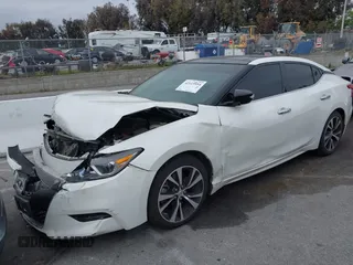 2018 Nissan Maxima SL with VIN 1N4AA6AP9JC399142, listed as a IAAI auction lot 42115954 with 77,191 mi miles and . Bid and sale history available at DreamBid. Image 2.