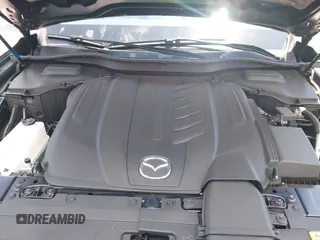 2025 Mazda CX-90 Preferred z VIN JM3KKBHD7S1200318, wystawiony jako IAAI lot #42045306 z przebiegiem 4 886 mil mil oraz . Historia ofert i sprzedaży dostępna na DreamBid. Obrazek 10.