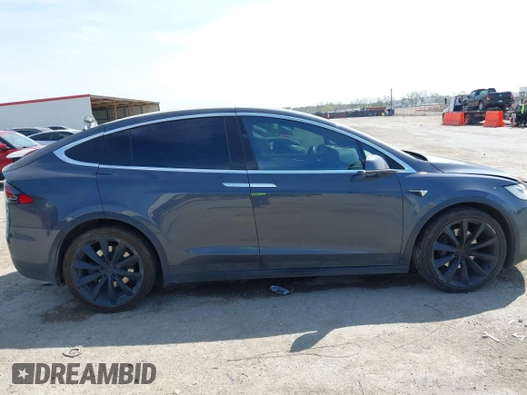 2017 Tesla Model X 90D with VIN 5YJXCBE22HF079194, listed as a IAAI auction lot 41895591 with 102,437 mi miles and . Bid and sale history available at DreamBid. Image 13.