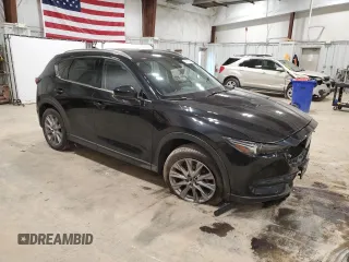 2021 Mazda CX-5 Grand Touring with VIN JM3KFBDM7M0467445, listed as a Copart auction lot 51287645 with 72,241 mi miles and Non Repairable. Bid and sale history available at carsss.com. Image 4.