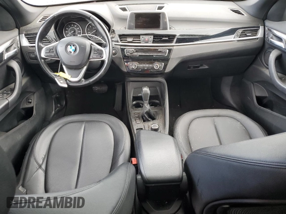 2017 BMW X1 sDrive28i with VIN WBXHU7C39H5H37756, listed as a Copart auction lot 50769975 with 82,479 mi miles and Salvage Title. Bid and sale history available at carsss.com. Image 8.