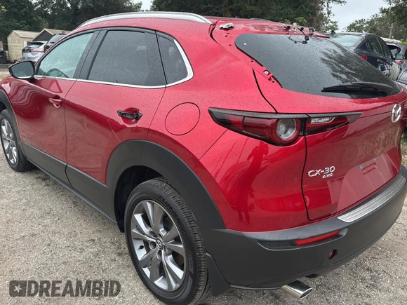2024 Mazda CX-30 S Preferred z VIN 3MVDMBCM0RM614880, wystawiony jako Copart lot #86984534 z przebiegiem 1 967 mil mil oraz Czysty tytuł • Clean title. Historia ofert i sprzedaży dostępna na DreamBid. Obrazek 3.