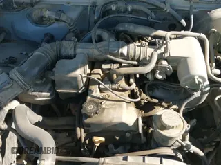 2002 Toyota Tacoma z VIN 5TENL42N92Z064523, wystawiony jako IAAI lot #42228845 z przebiegiem 305 172 mil mil oraz . Historia ofert i sprzedaży dostępna na DreamBid. Obrazek 13.