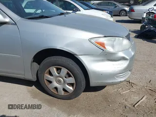 2004 Toyota Camry LE with VIN 4T1BE32K74U350908, listed as a IAAI auction lot 42099989 with 120,971 mi miles. Bid and sale history available at carsss.com. Image 6.