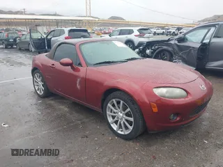 2006 Mazda MX-5 Miata Grand Touring with VIN JM1NC25F560107625, listed as a IAAI auction lot 41741741 with 121,260 mi miles and . Bid and sale history available at DreamBid. Image 1.