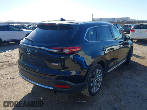 2018 Mazda CX-9 Signature with VIN JM3TCBEY2J0207786, listed as a IAAI auction lot 41478330 with 99,311 mi miles and . Bid and sale history available at DreamBid. Image 4.