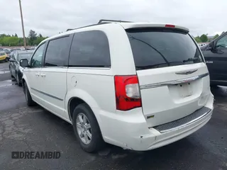 2013 Chrysler Town & Country Touring with VIN 2C4RC1BG7DR629829, listed as a IAAI auction lot 42152230 with 188,473 mi miles. Bid and sale history available at carsss.com. Image 3.