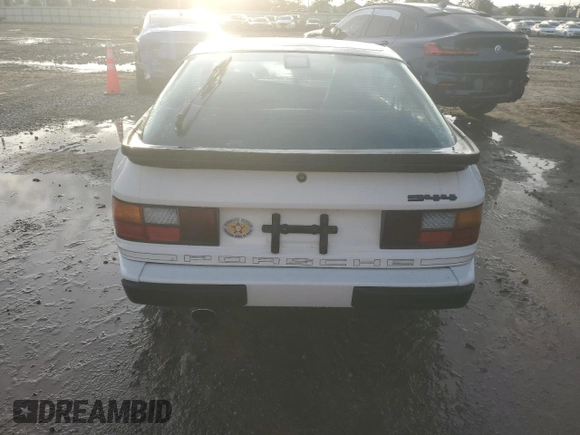 1987 Porsche 944 z VIN WP0AB0948HN473051, wystawiony jako Copart lot #73666654 z przebiegiem 82 580 mil mil oraz Szkoda całkowita • Salvage title. Historia ofert i sprzedaży dostępna na DreamBid. Obrazek 6.