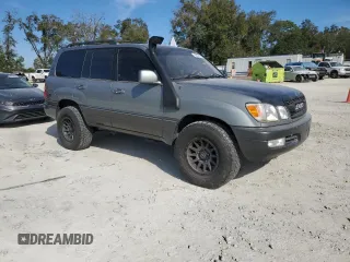 2002 Lexus LX 470 z VIN JTJHT00W723514716, wystawiony jako Copart lot #42646295 z przebiegiem 188 817 mil mil oraz Szkoda całkowita • Salvage title. Historia ofert i sprzedaży dostępna na DreamBid. Obrazek 4.