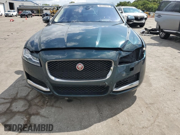 2016 Jaguar XF 35t Prestige with VIN SAJBE4BV3GCY13708, listed as a Copart auction lot 68120914 with 77,223 mi miles and Salvage Title. Bid and sale history available at carsss.com. Image 5.