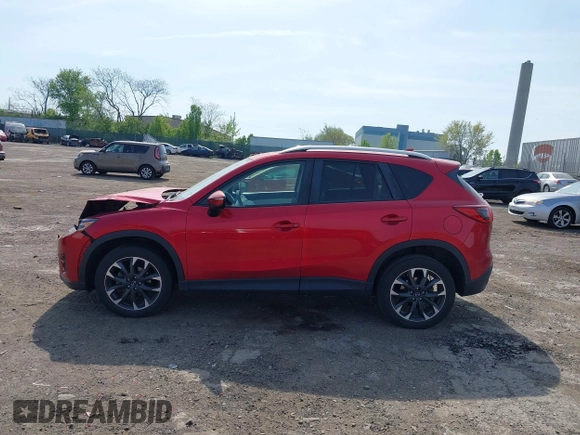 2016 Mazda CX-5 Grand Touring with VIN JM3KE4DY9G0850583, listed as a IAAI auction lot 42075545 with 92,789 mi miles and . Bid and sale history available at carsss.com. Image 14.