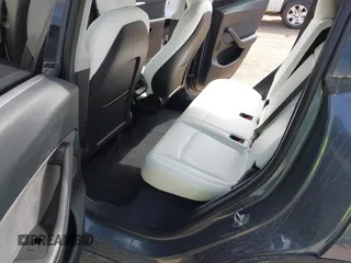 2022 Tesla Model Y Long Range with VIN 7SAYGDEE5NF534259, listed as a IAAI auction lot 41860246 with 24,513 mi miles and . Bid and sale history available at carsss.com. Image 8.