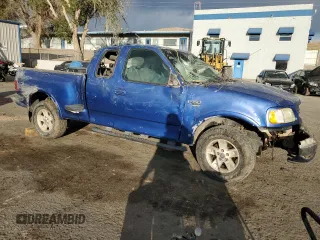 2002 Ford F-150 XL with VIN 1FTRX08L12KA21447, listed as a Copart auction lot 73152664 with Not provided miles and Salvage title. Bid and sale history available at DreamBid. Image 4.