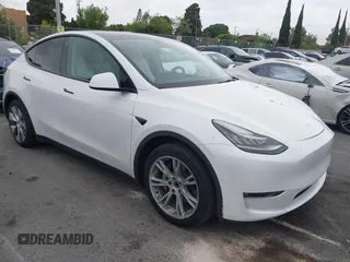 2021 Tesla Model Y Long Range z VIN 5YJYGDEE1MF140334, wystawiony jako IAAI lot #42203625 z przebiegiem 49 237 mil mil oraz . Historia ofert i sprzedaży dostępna na DreamBid. Obrazek 1.