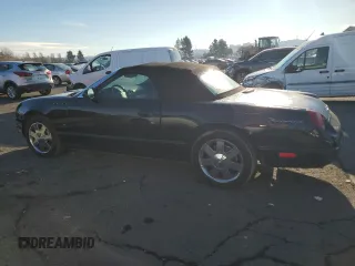 2003 Ford Thunderbird Deluxe with VIN 1FAHP60A83Y104631, listed as a Copart auction lot 82846984 with Not Provided miles and Clean Title. Bid and sale history available at DreamBid. Image 2.