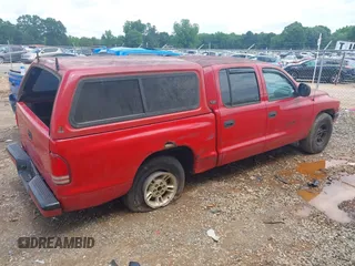 2000 Dodge Dakota Sport with VIN 1B7GL2AN7YS607119, listed as a IAAI auction lot 42377808 with 287,892 mi miles and . Bid and sale history available at DreamBid. Image 4.