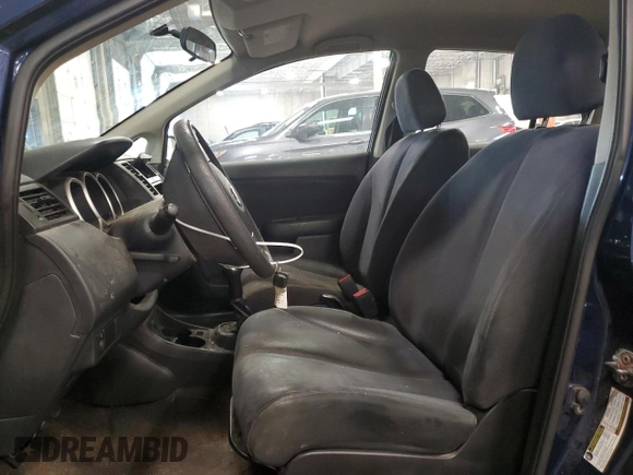 2009 Nissan Versa 1.6 with VIN 3N1CC11E49L458857, listed as a Copart auction lot 59195275 with 100,351 mi miles and Salvage title. Bid and sale history available at DreamBid. Image 7.