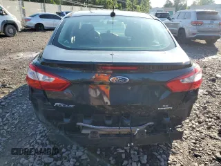 2013 Ford Focus SE z VIN 1FADP3F27DL369634, wystawiony jako Copart lot #61409725 z przebiegiem 122 709 mil mil oraz Szkoda całkowita • Salvage title. Historia ofert i sprzedaży dostępna na DreamBid. Obrazek 6.