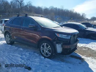 2015 Ford Edge Titanium with VIN 2FMTK4K99FBB43039, listed as a IAAI auction lot 41406613 with 115,524 mi miles. Bid and sale history available at carsss.com. Image 1.