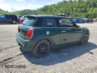 2014 MINI Hardtop S with VIN WMWXM7C50ET970033, listed as a Copart auction lot 56160735 with 125,208 mi miles and Salvage title. Bid and sale history available at DreamBid. Image 3.
