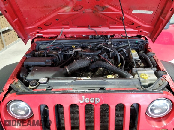 2008 Jeep Wrangler Unlimited X with VIN 1J8GA39128L645762, listed as a Copart auction lot 57888345 with 205,178 mi miles and Salvage title. Bid and sale history available at DreamBid. Image 12.