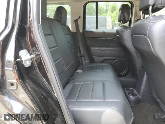 2016 Jeep Patriot High Altitude with VIN 1C4NJRFBXGD595443, listed as a Copart auction lot 59985755 with 171,776 mi miles and Salvage title. Bid and sale history available at DreamBid. Image 11.