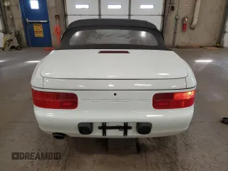 1992 Porsche 968 z VIN WP0CA2960NS840191, wystawiony jako Copart lot #75197694 z przebiegiem 122 386 mil mil oraz Szkody całkowita. Historia ofert i sprzedaży dostępna na DreamBid. Obrazek 6.