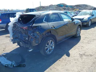 2024 Mazda CX-30 S Carbon Edition with VIN 3MVDMBCM4RM607530, listed as a IAAI auction lot 41796426 with 3,715 mi miles and . Bid and sale history available at DreamBid. Image 4.